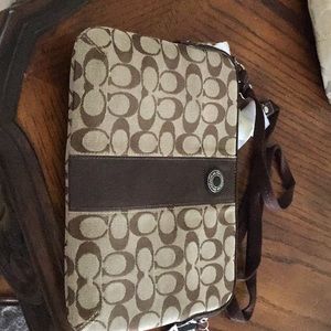 Coach tablet crossbody bag . Brand new with tags.